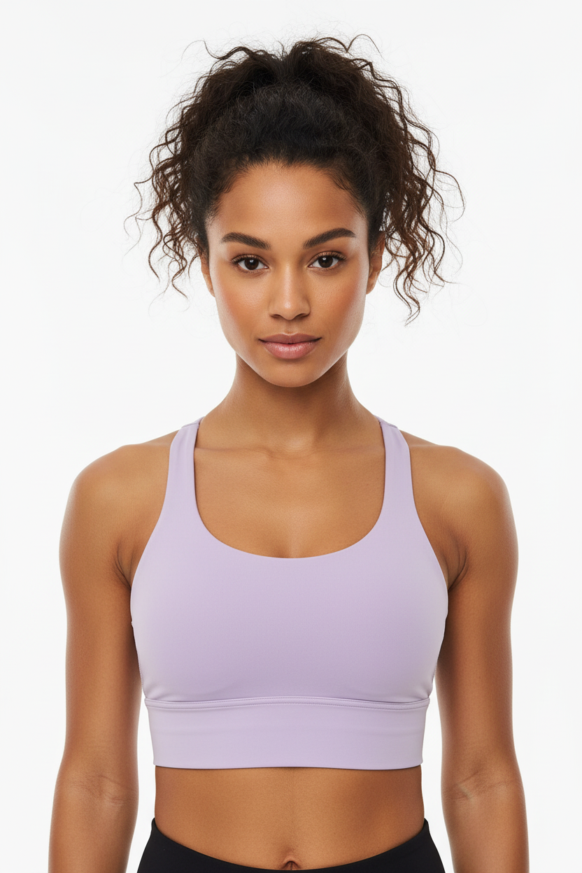 Model wearing orchid lavender cross-back sports bra